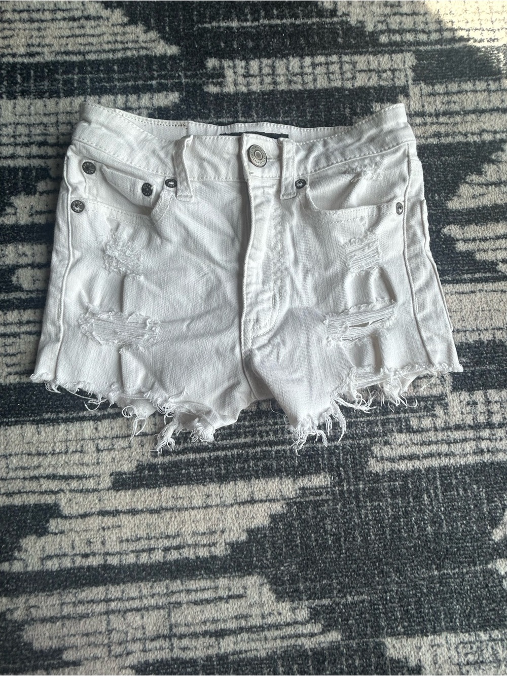 High-Rise White Distressed Denim Shorts
